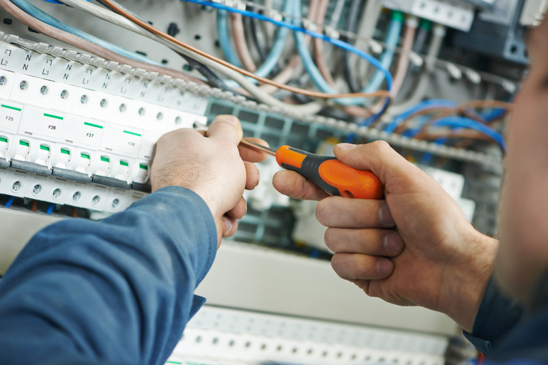 electrician checking wires